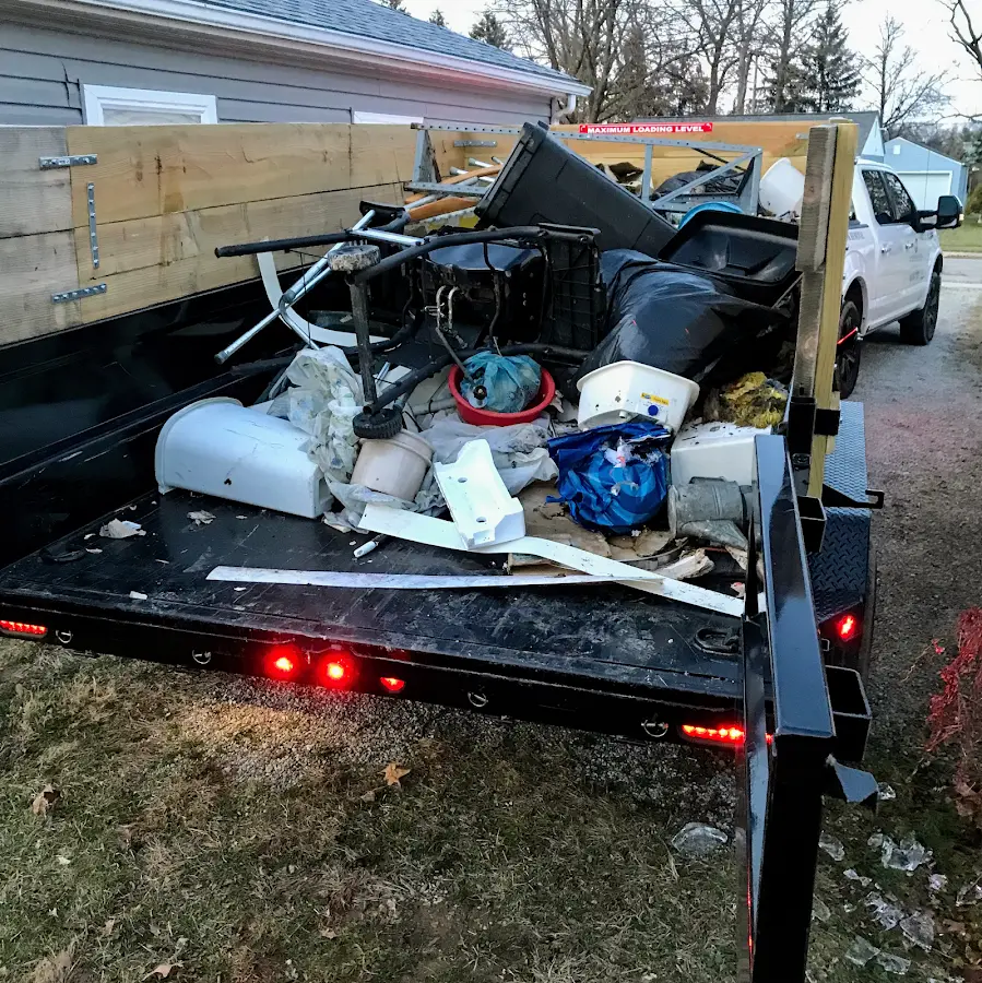 Roll-off dumpster delivered to a residential driveway in North Collins